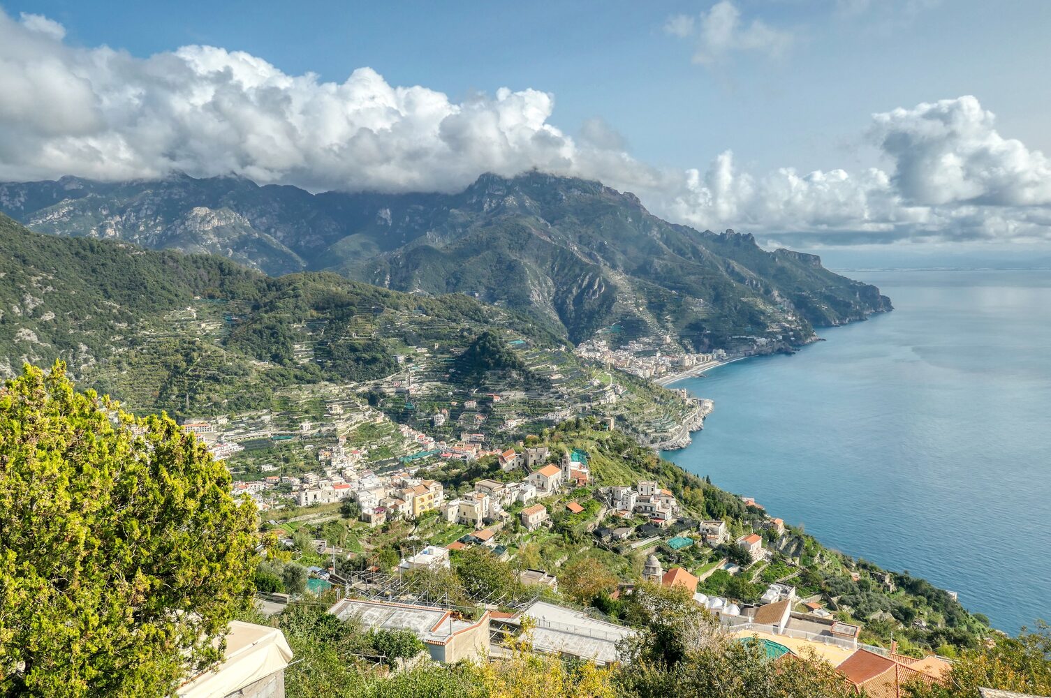 Colourful clifftop villages cascading down to the turquoise sea along the Amalfi Coast