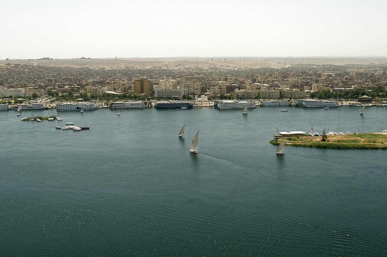 A traditional felucca sailboat on the Nile River at Aswan