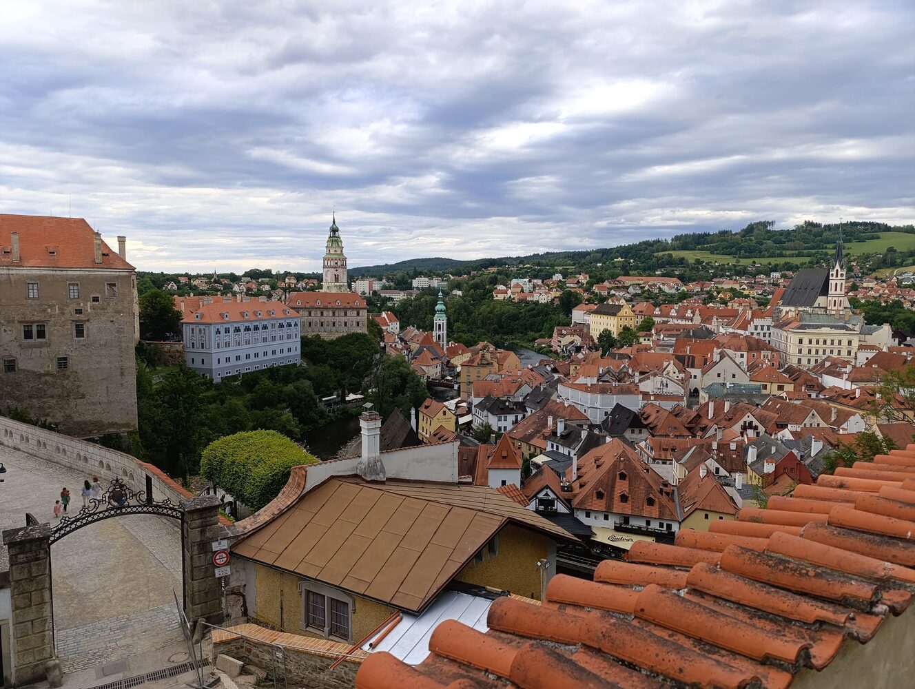 Český Krumlov castle and its distinctive round tower rising above the Vltava river bend and red-roofed old town