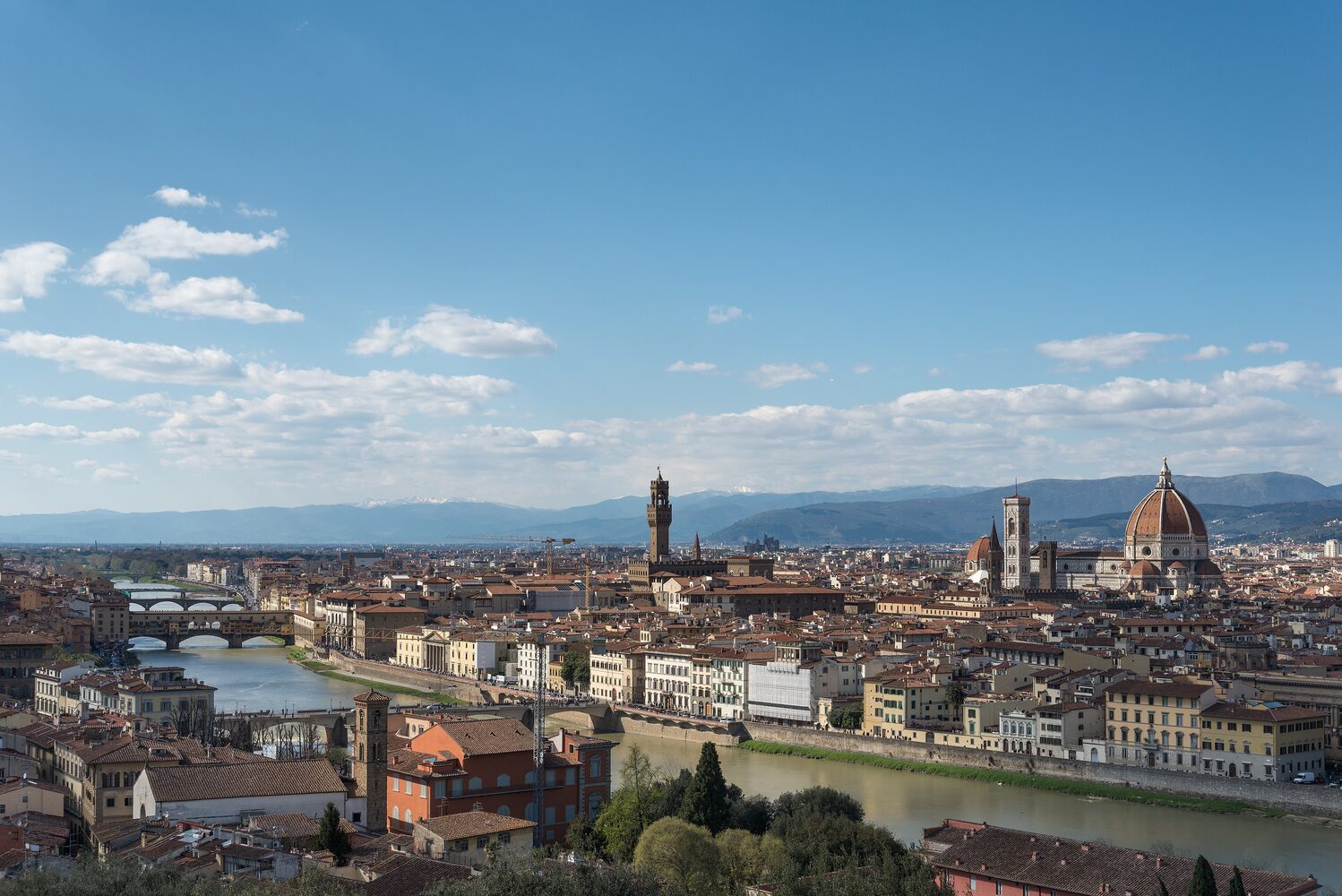 Florence's historic skyline with the Florence Cathedral dome rising above terracotta rooftops