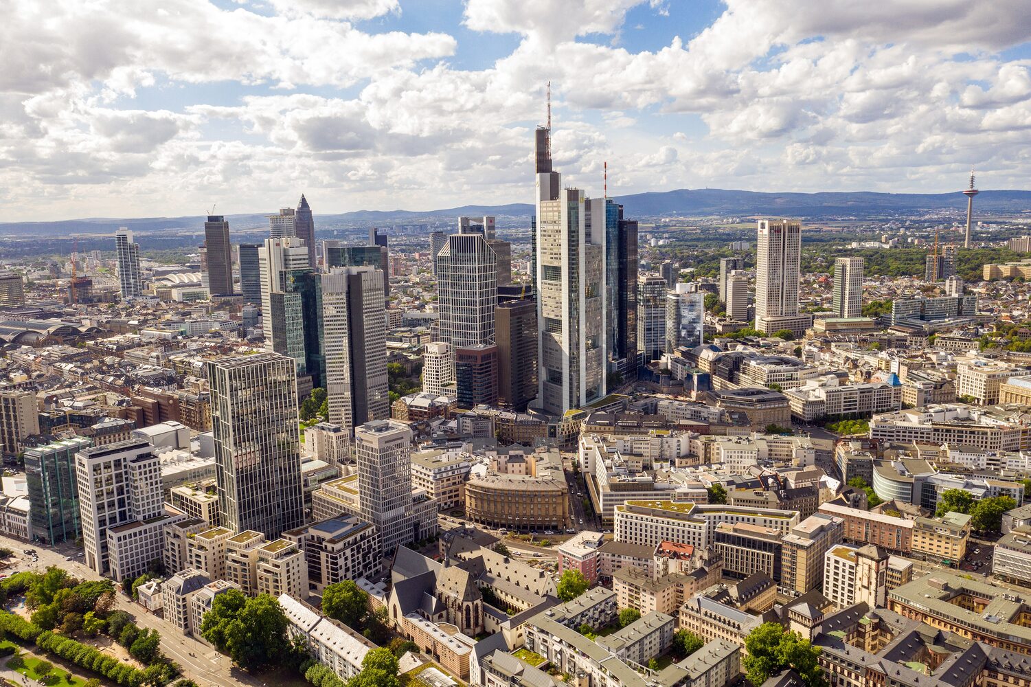 Frankfurt's Römerberg square with its medieval half-timbered town hall and the modern skyline beyond