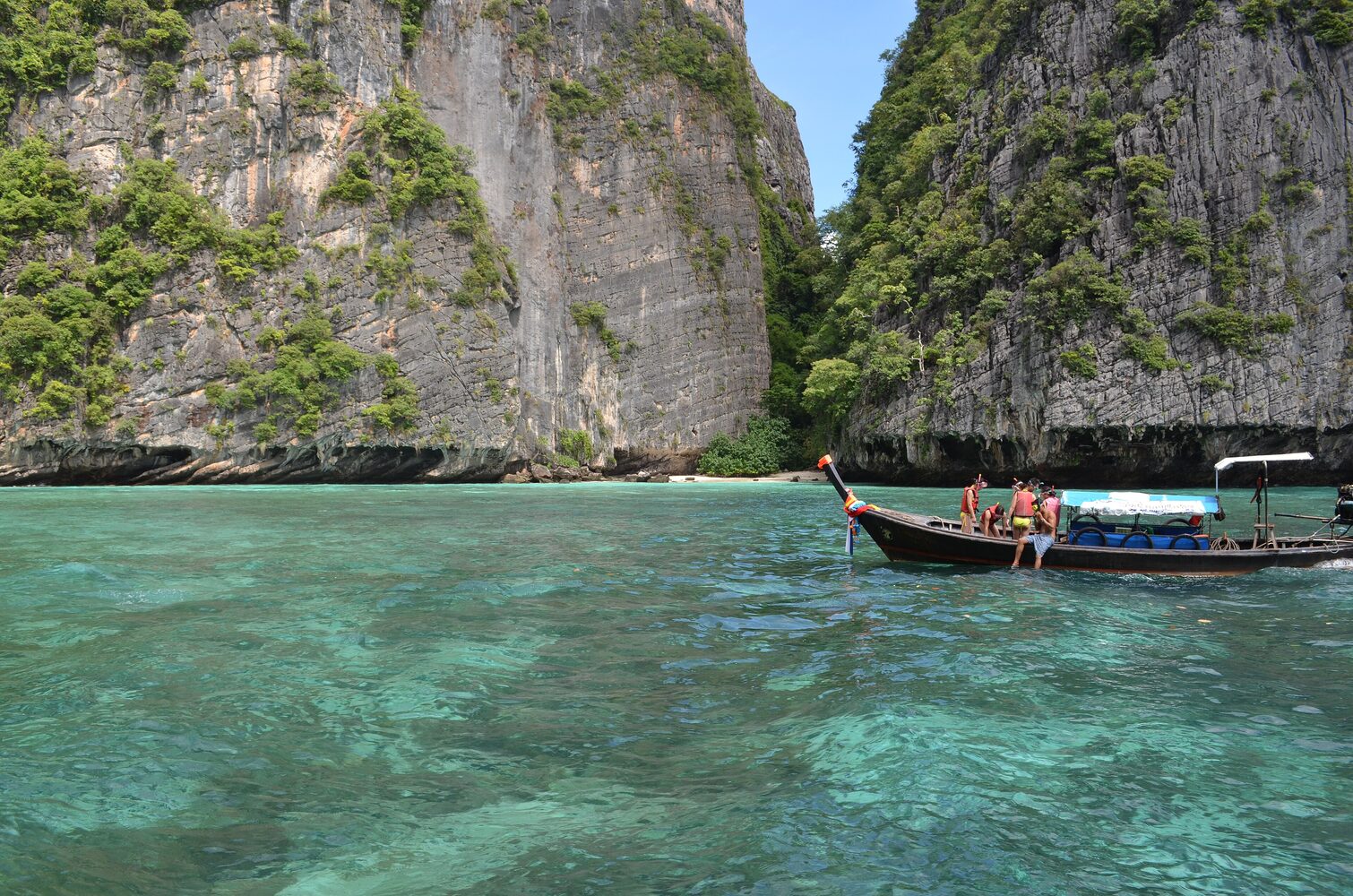 Limestone karst cliffs rising from turquoise water near Railay Beach, Krabi