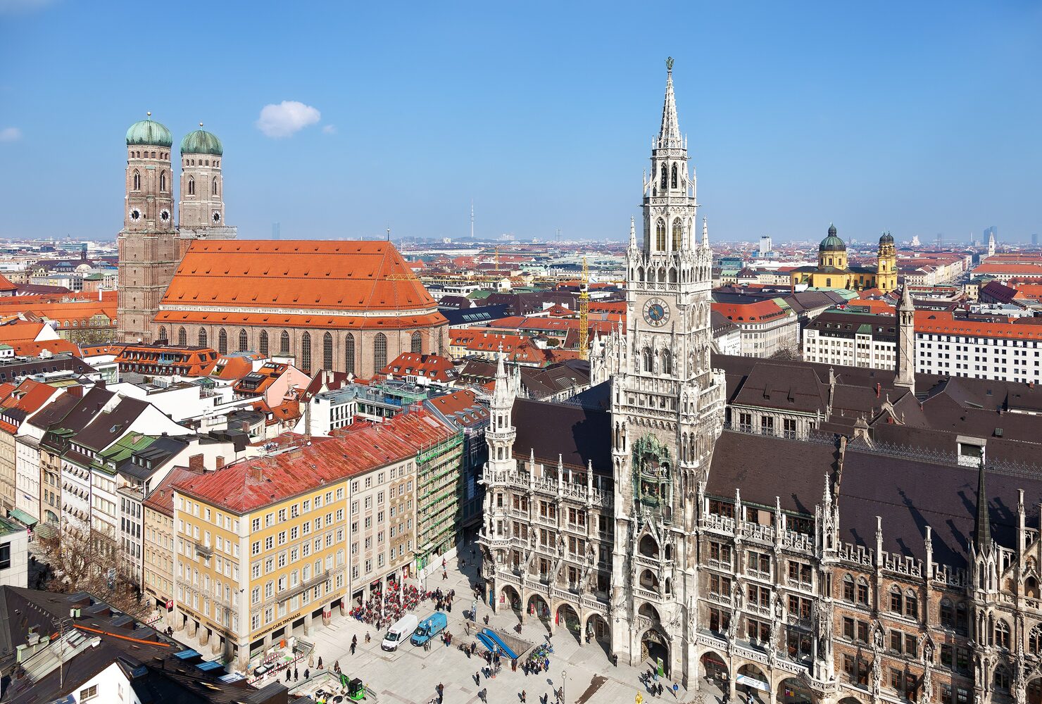 Munich's Marienplatz with the Neo-Gothic New Town Hall and Frauenkirche towers on a clear day