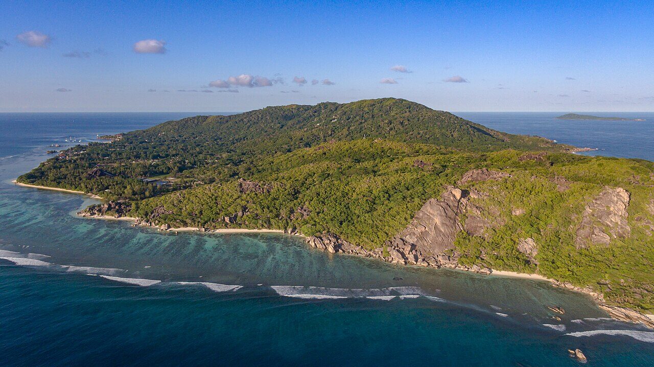 Giant granite boulders and a pristine beach on a Seychelles island